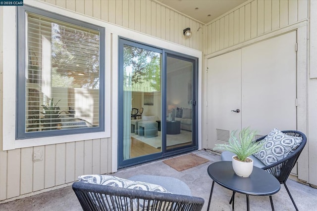 doorway to property with a patio