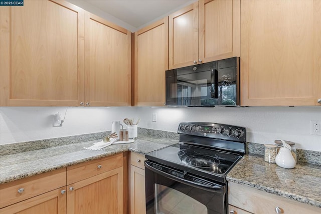 kitchen with light stone countertops, black appliances, and light brown cabinets