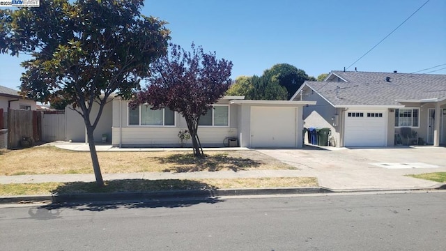 ranch-style home with a garage