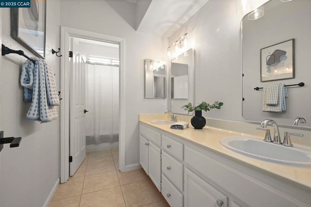 bathroom with vanity and tile patterned floors