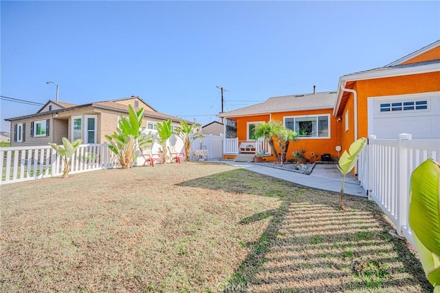 view of yard featuring a garage