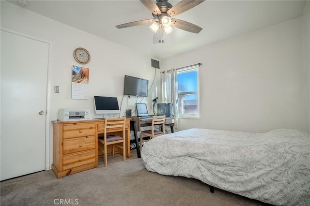 bedroom with ceiling fan and carpet floors