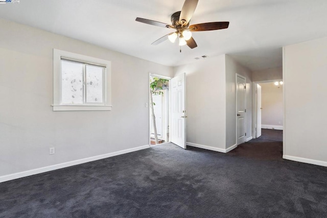 carpeted empty room with ceiling fan