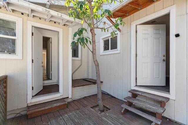 doorway to property with a wooden deck