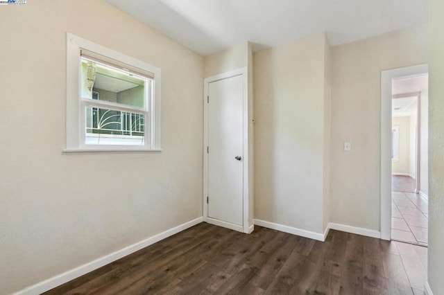 interior space with dark hardwood / wood-style floors