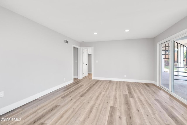 unfurnished room featuring light hardwood / wood-style floors