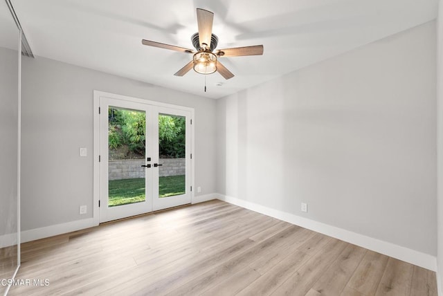 unfurnished room with light hardwood / wood-style flooring, french doors, and ceiling fan