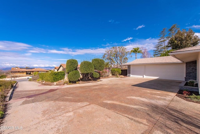 view of yard with a garage