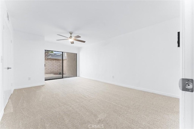 unfurnished room featuring light carpet, ceiling fan, visible vents, and baseboards