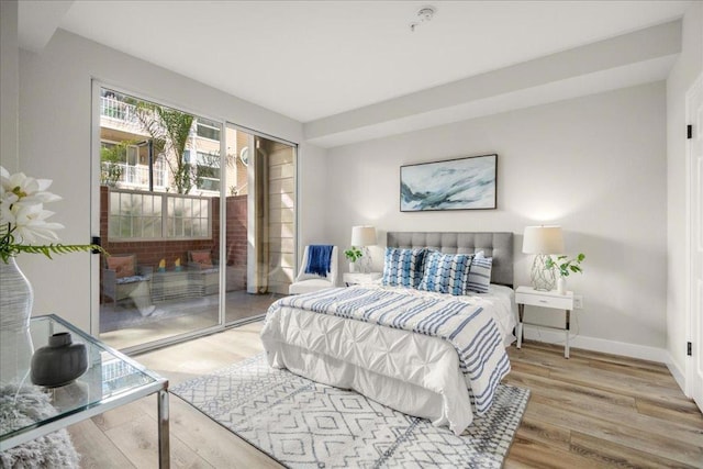 bedroom with light hardwood / wood-style flooring