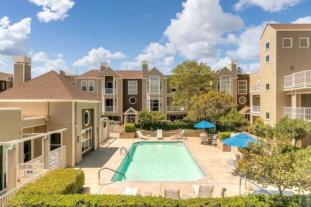 view of pool with a patio