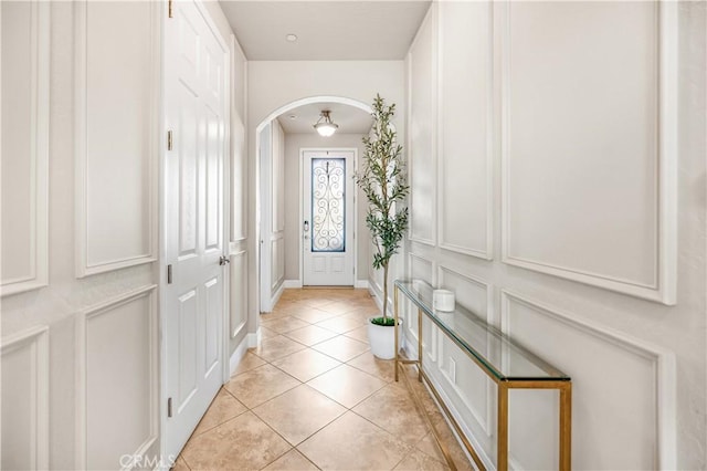 entryway featuring light tile patterned floors