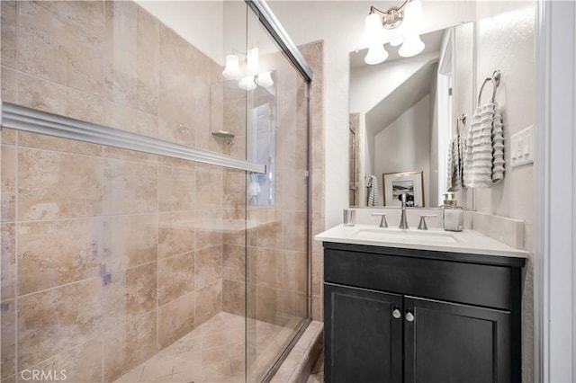 bathroom featuring vanity and an enclosed shower