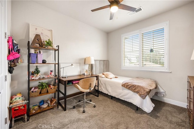 carpeted bedroom featuring ceiling fan