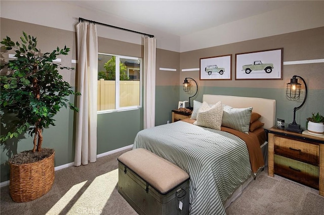 bedroom featuring light colored carpet