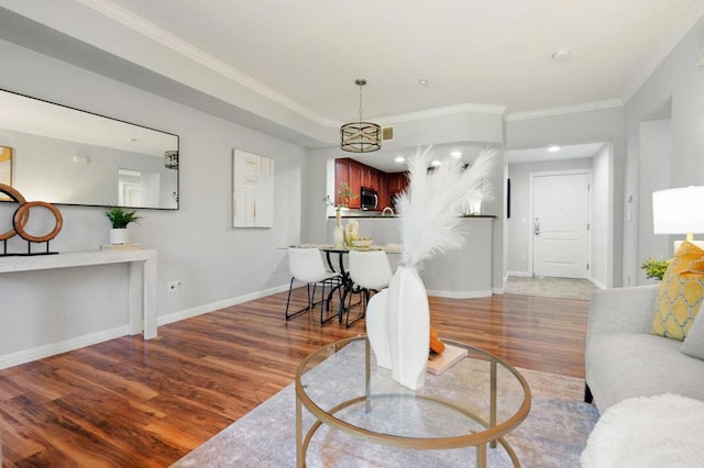 living room featuring crown molding and dark hardwood / wood-style floors