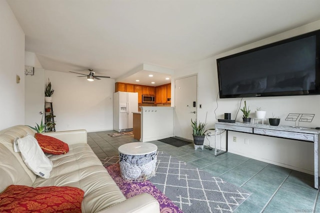 tiled living room featuring ceiling fan