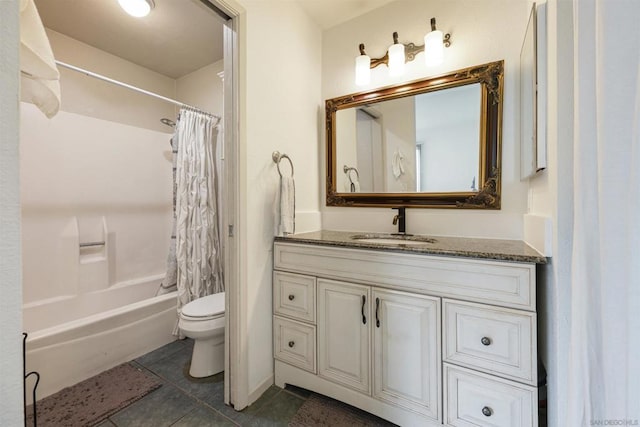 full bathroom with shower / tub combo with curtain, vanity, and toilet