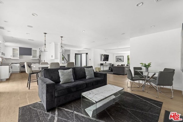 living room featuring light wood-type flooring