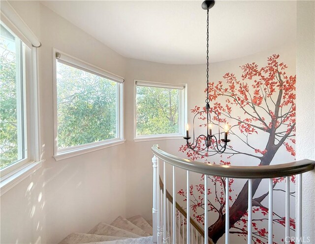 bedroom featuring an inviting chandelier