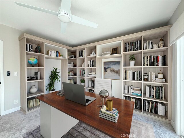 carpeted office with ceiling fan