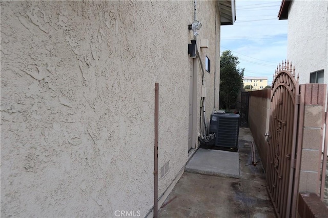 view of home's exterior featuring central AC