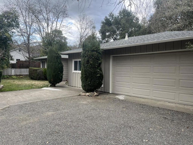 single story home with a garage