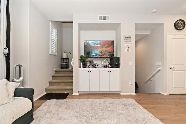 living room featuring light hardwood / wood-style floors