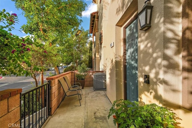 balcony featuring central AC unit