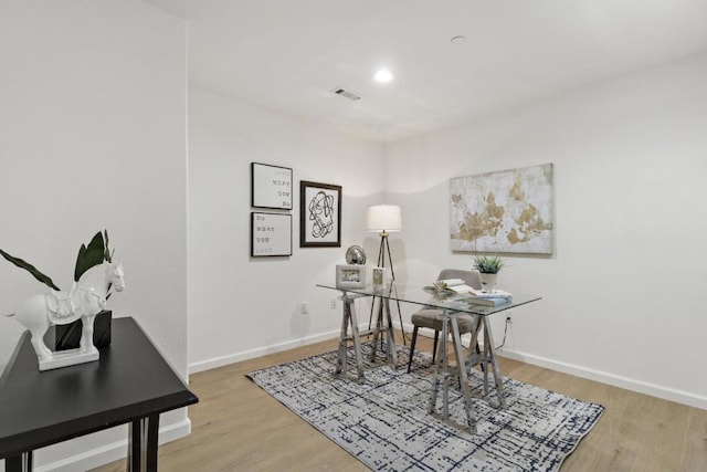 office with hardwood / wood-style flooring