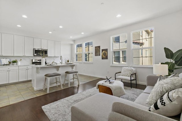 living room featuring light wood-type flooring