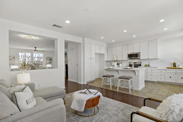 living room featuring light wood-type flooring