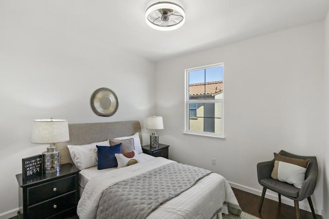 bedroom featuring dark wood-type flooring