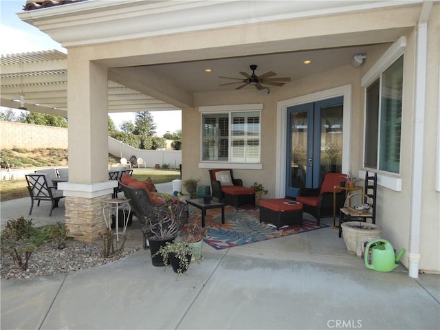 view of patio / terrace featuring a pergola, outdoor lounge area, french doors, and ceiling fan