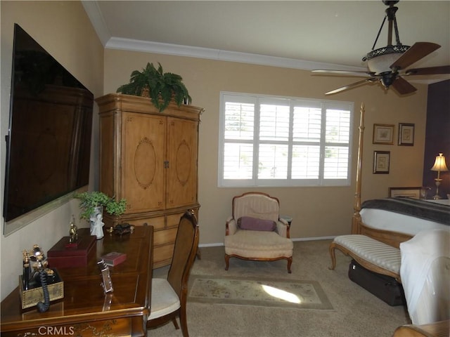 interior space with ornamental molding, ceiling fan, and carpet