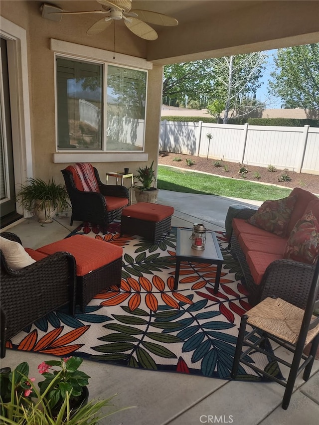 view of patio / terrace with ceiling fan and an outdoor hangout area