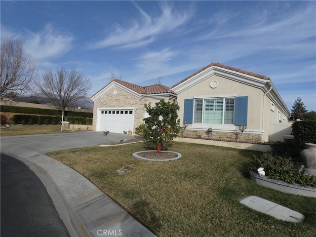 single story home with a garage and a front lawn