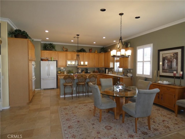 dining space with crown molding