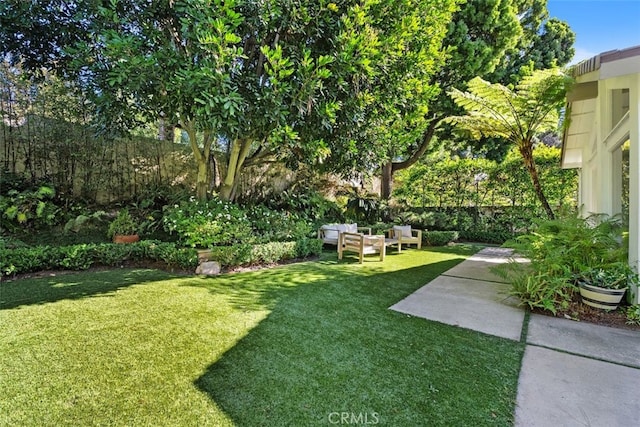 view of yard with an outdoor living space