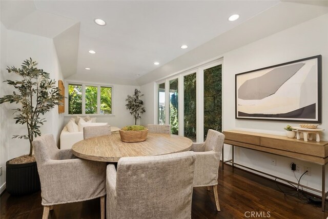 dining room with dark hardwood / wood-style floors