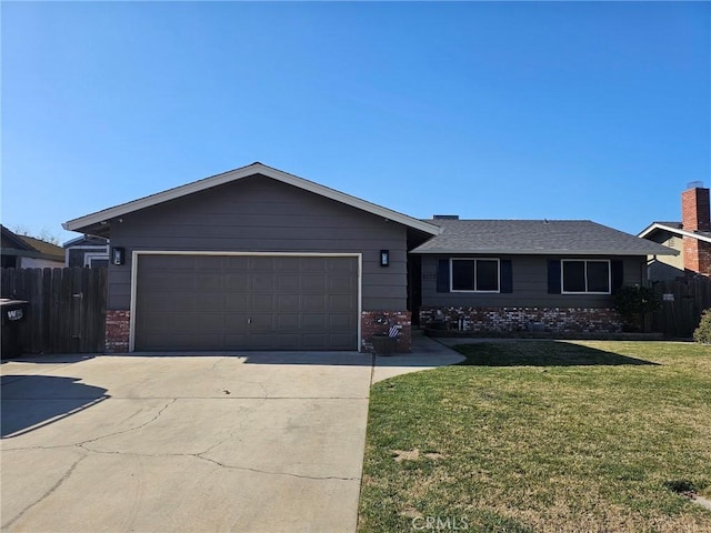 8139 Winfield Dr, Hilmar, CA 95324 - ranch-style house with a garage and a front lawn