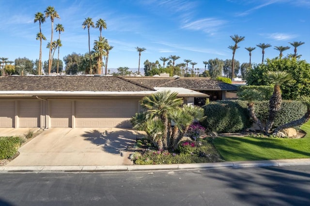 single story home featuring a garage