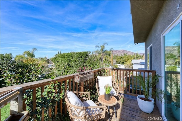 balcony featuring a mountain view