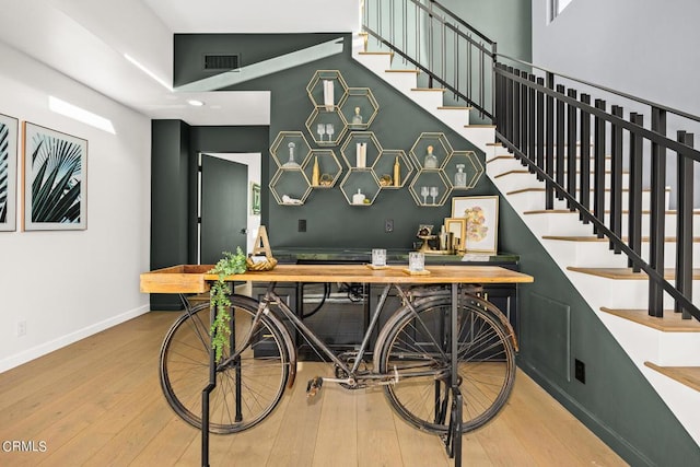 bar featuring hardwood / wood-style floors