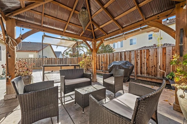 view of patio / terrace with a grill, a gazebo, and outdoor lounge area