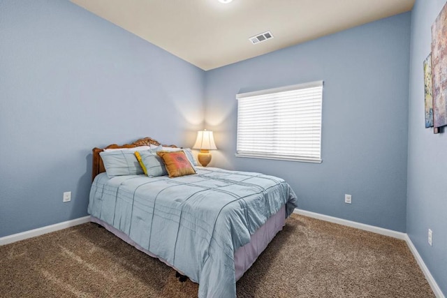 bedroom featuring carpet