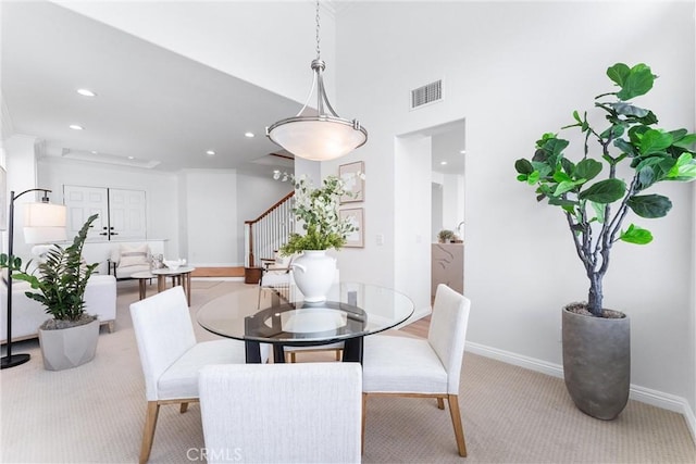 view of carpeted dining space