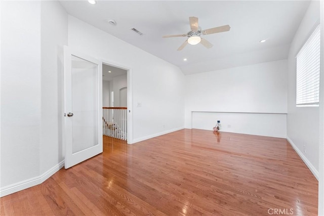 unfurnished room featuring ceiling fan and light hardwood / wood-style flooring