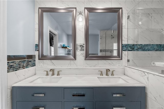 bathroom featuring tile walls and vanity