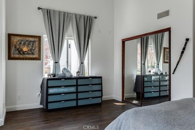 bedroom featuring dark hardwood / wood-style floors